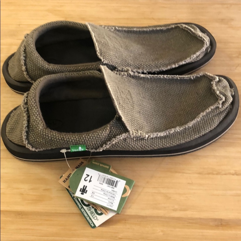 Men’s Sanuk size 12 slip ons new w/ tags